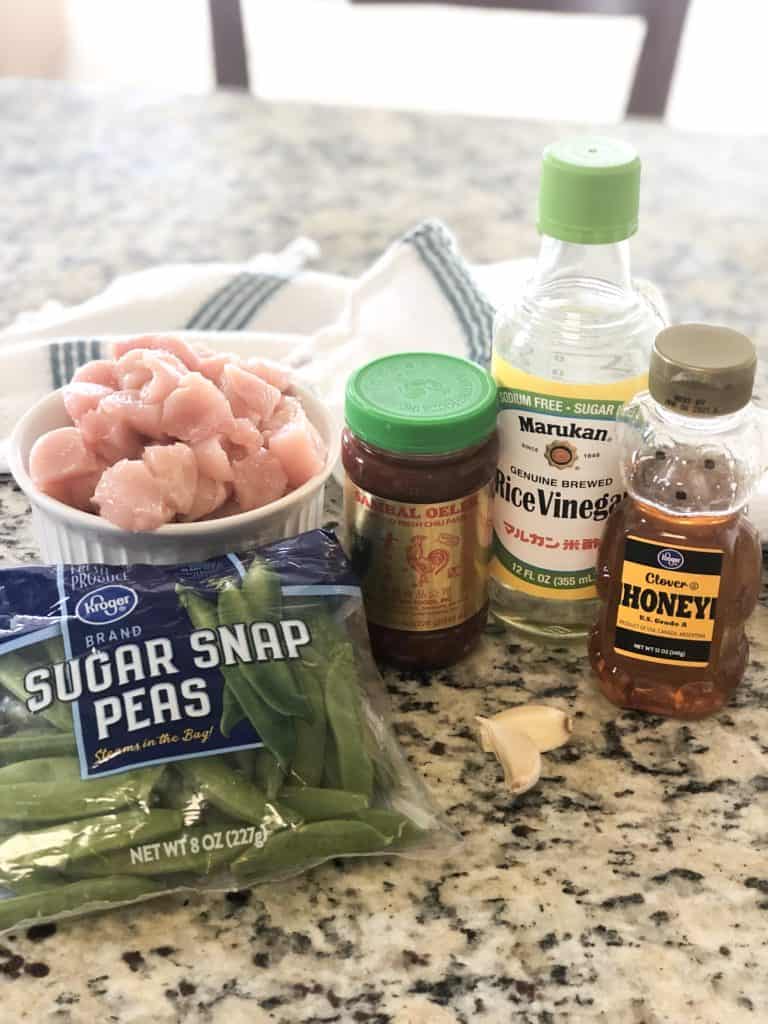 Chicken and Snap Pea Stir Fry Ingredients Chicken and Snap Pea Stir Fry, A delicious one-pan meal that will feed the whole family. A great healthy meal that is gluten free. A gluten free one-pan meal for an easy chicken dinner.