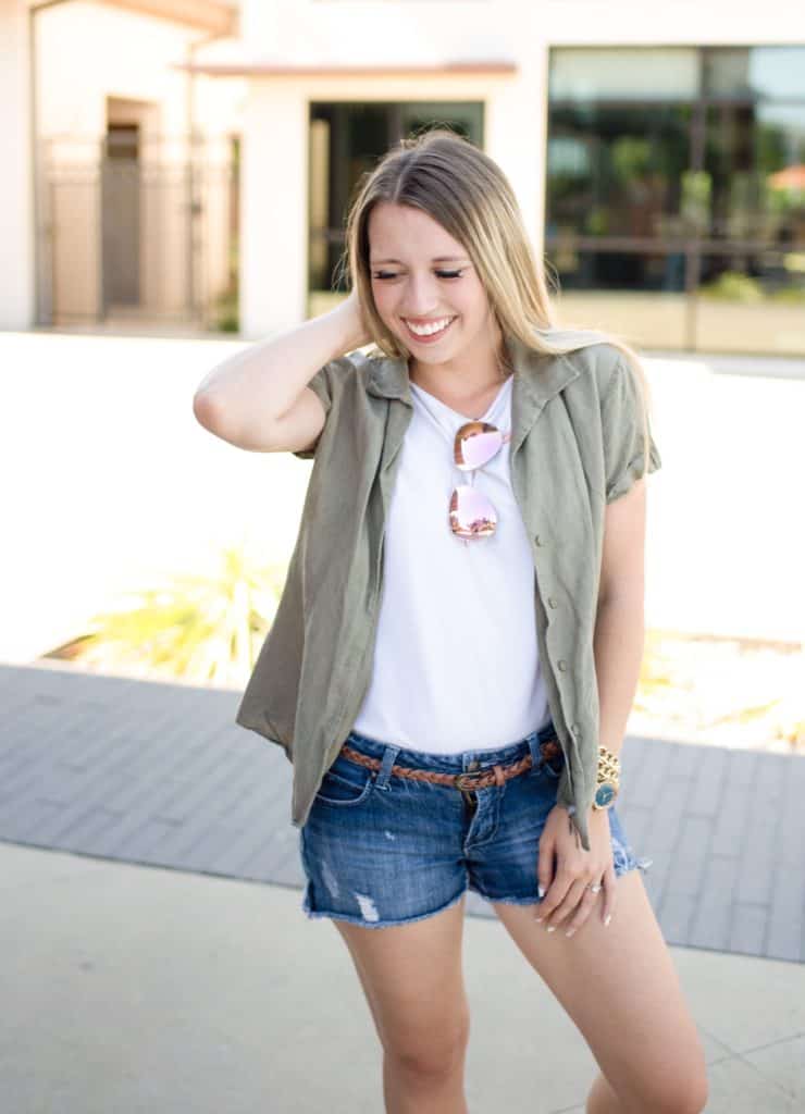 August outfits for school, back to school, summer august outfits, casual, august outfits for women, cute summer outfits, pool outfit, beach outfit, vacation style, casual green button up shirt, white tank top, cream tank top, distressed shorts, brown belt
