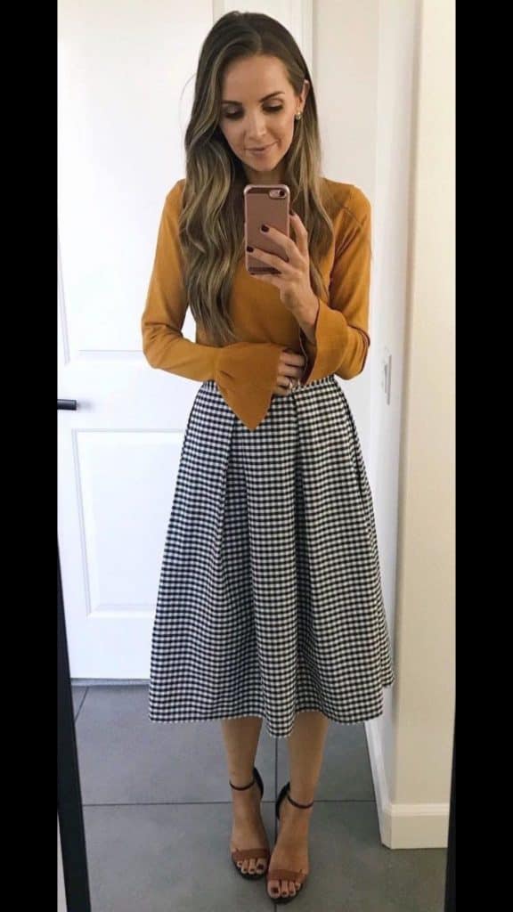September outfits, september outfit inspiration, mustard yellow long sleeve top, gingham black and white skirt, brown pumps, brown wedges, fall outfits, modest church outfits