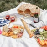 How to make a picnic charcuterie board plus my favorite charcuterie board ideas that anyone can try. There are so many different food options that can fit into a charcuterie board so it works for all different tastes buds. This easy DIY charcuterie board is simple and beautiful so give it a try. This was a charcuterie board for two but we definitely had tons of leftovers so we could do a second board at home. A gorgeous picnic at the Utah capitol building.