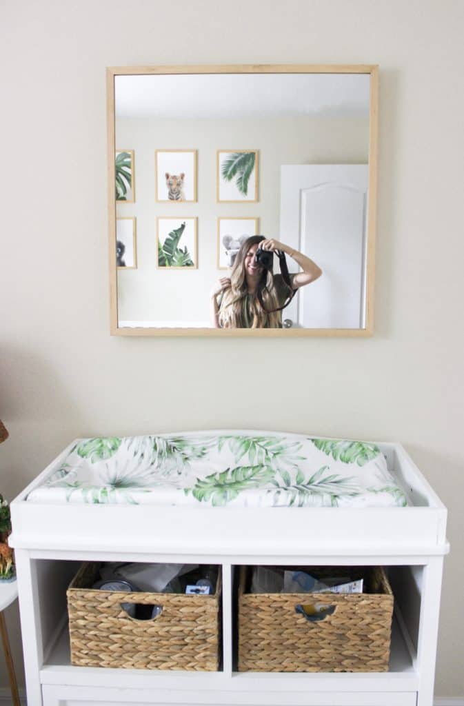 A fun selfie idea in my newly finished nursery! A gender neutral safari nursery is such a cute nursery theme! This safari nursery theme is fun, light and airy, plus absolutely adorable. There are a few travel nursery details thrown in and it is the happiest room in the house. I hope it helps you with your own nursery inspiration.