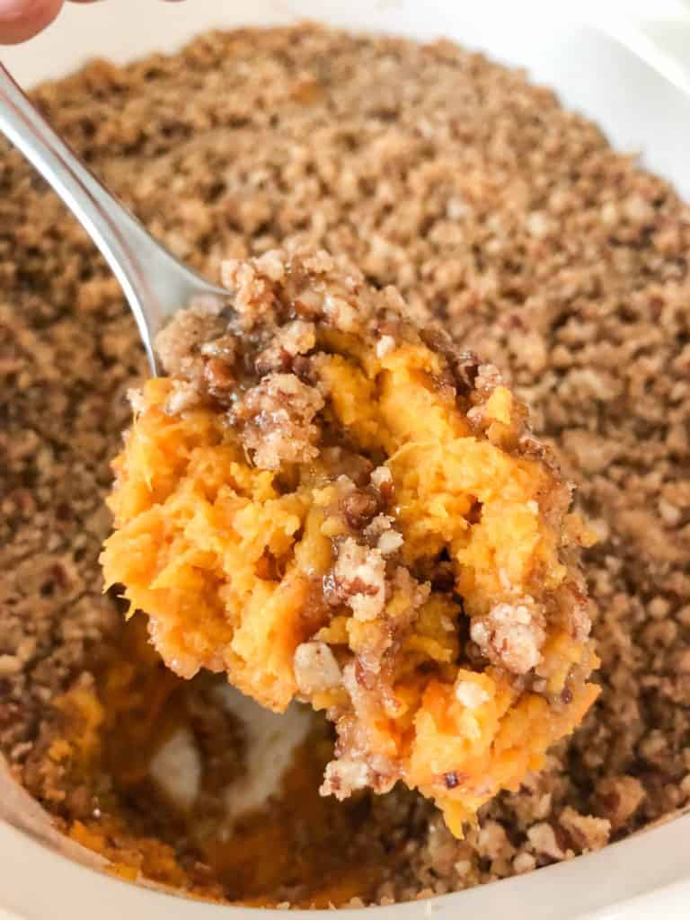 This sweet and delicious casserole is fall favorite recipe in our family. A perfect thanksgiving side dish that is filling and disappears every year. The creamy sweet potato base is delicious and the pecan topping adds the perfect amount of crunch. As an added bonus this ruth's chris copycat sweet potato casserole  can be made ahead of time. Make ahead sides are a great way to save time on thanksgiving so you can focus on family, football and turkey.