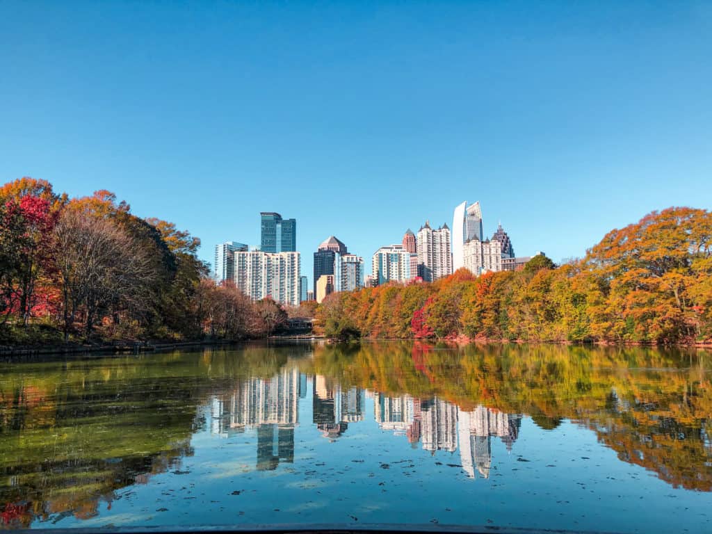 the skyline of Atlanta, Georgia can be seen from this beautiful spot in Piedmont Park. You can't see all of Atlanta in a day but you can have a good time during a stop on this Florida to Missouri road trip.