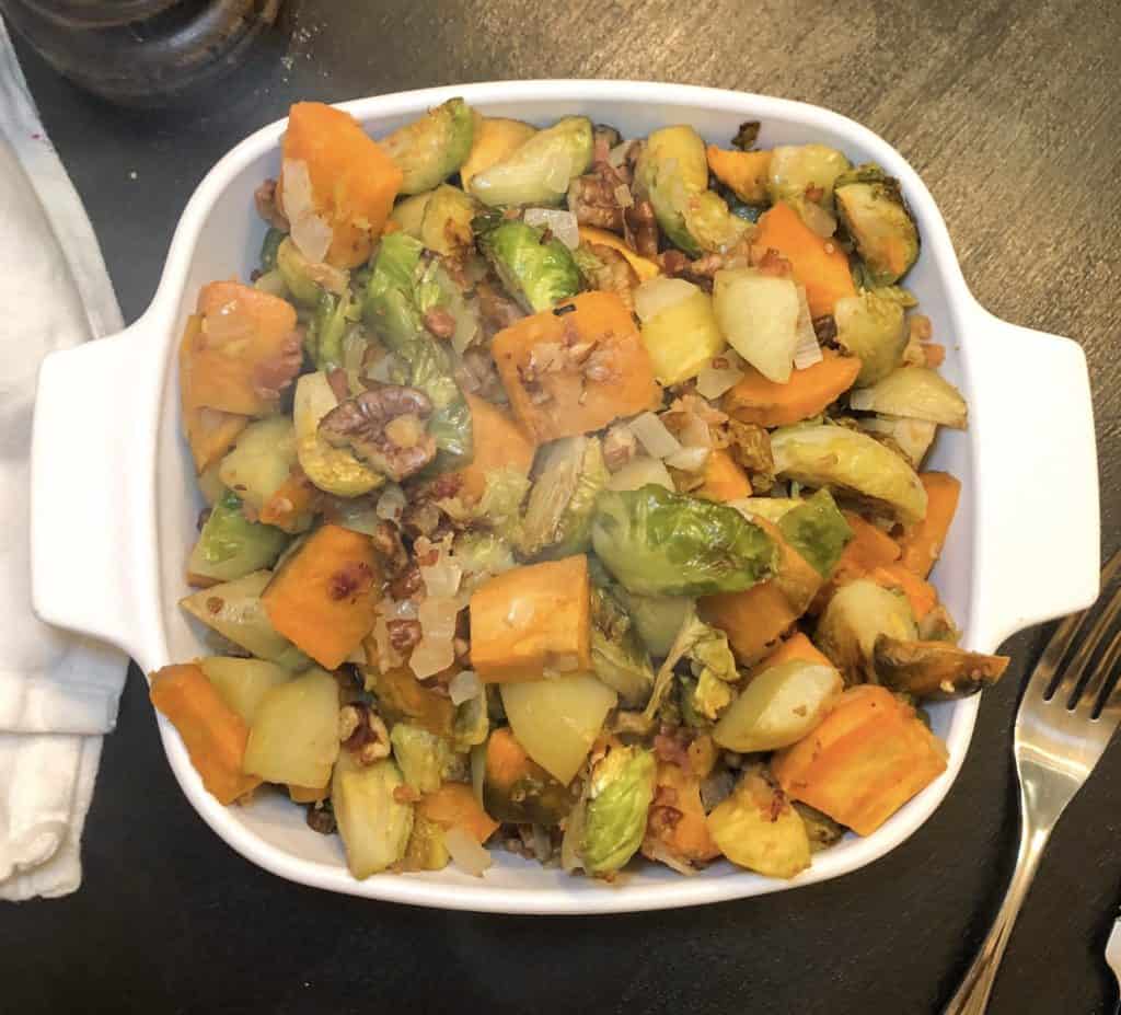 sweet potato and brussel sprout hash with bacon is a flavorful and healthy dish that everyone can enjoy.