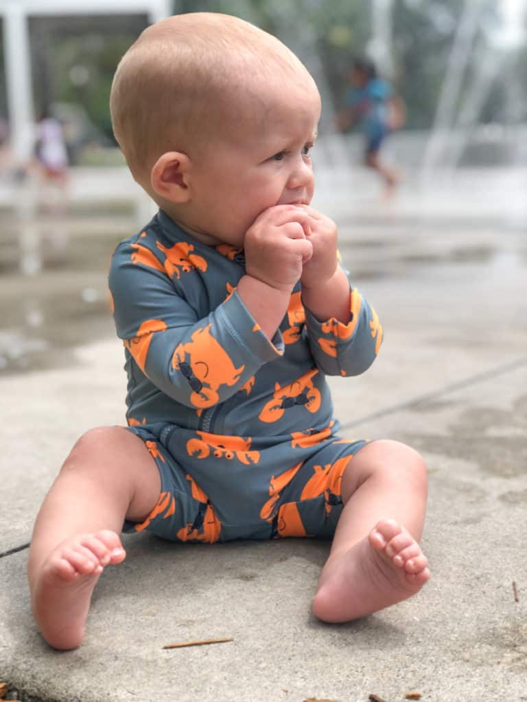Cute baby at Sims Splash Pad one of the 22 free Tampa splash pads you can visit this summer.