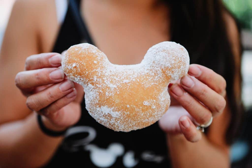 A yummy mickey mouse beignet at Disney World that you can have on your next day trip from Tampa. 