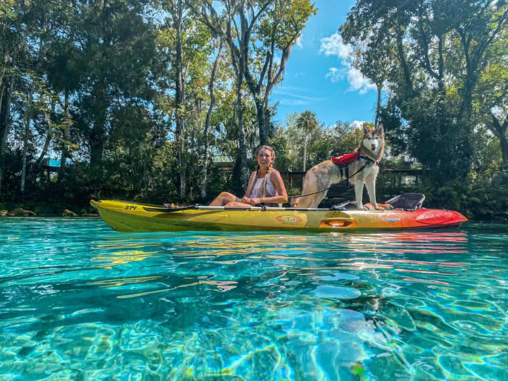Stopping to swim in Three Sisters Spring while kayaking Crystal River in Florida a popular place to swim with manatees and swim in the crystal clear waters of some of Floridas best springs like Three Sisters Spring.
