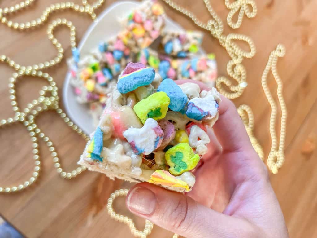 Lucky charms cereal bars are a gooey and delicious dessert to make  with the kids. They are a festive St. Patricks Day dessert or a fun pastel easter treat. have fun making this easy dessert!