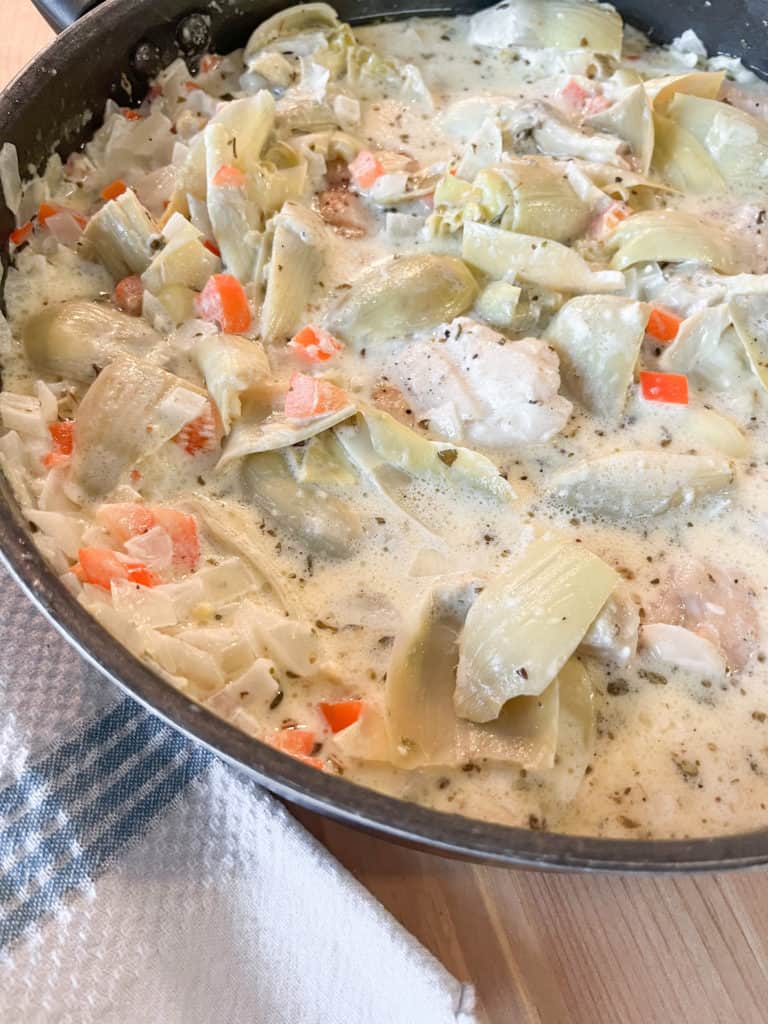 This creamy artichoke chicken recipe is a great way to add artichokes into your diet. It is a fairly healthy dish that will delight the tastebuds. This Rusty Bellies chicken dakota copycat recipe will become a favorite chicken dinner recipe quickly.