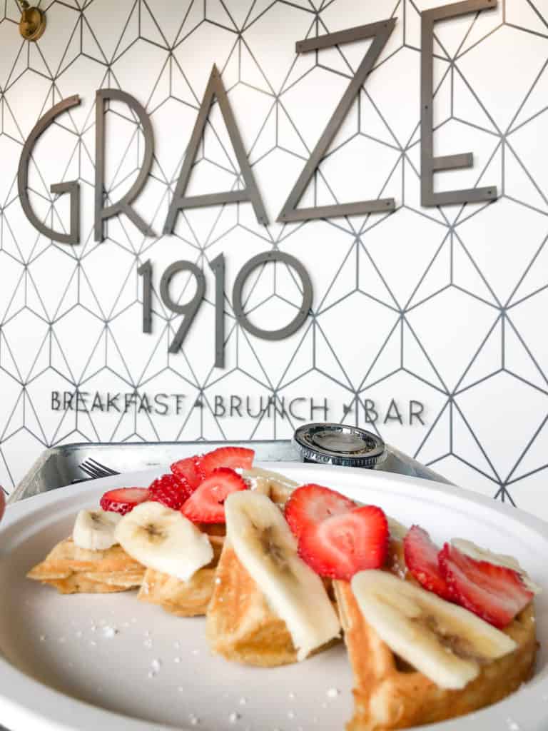 The waffle breakfast at Graze 1910, one of the many restaurants in Armature Works. It is also a fun  brunch spot in Tampa, Florida.
