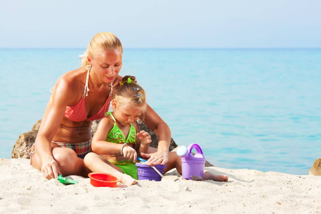 11 beach essentials for toddlers to make your next trip to the beach a smooth one. From snacks to toys to gear, preparation is key to a fun beach day with kids.