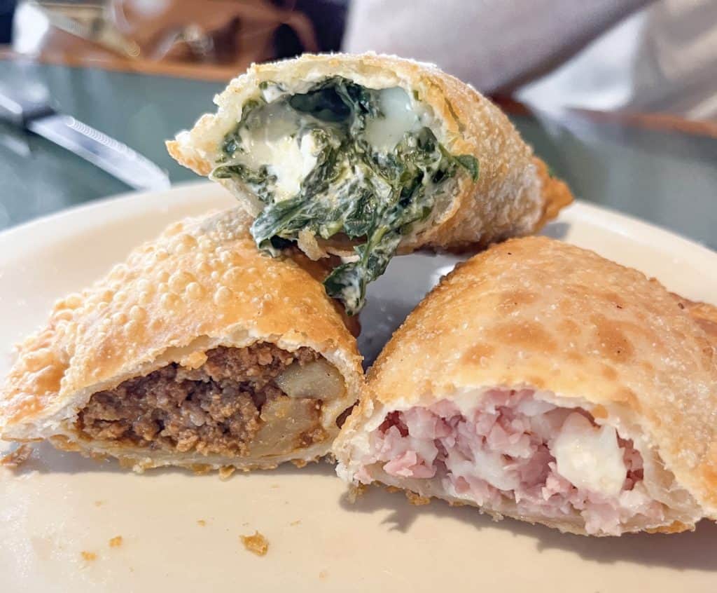 A carne empanada, ham empanada and spinach with cheese empanada from El Pub one of the best restaurants in Little Havana.