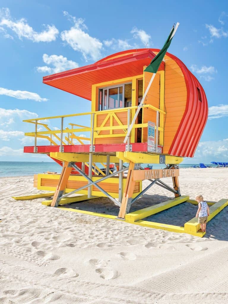 A colorful red, yellow and orange lifeguard stand on South Beach in Miami.