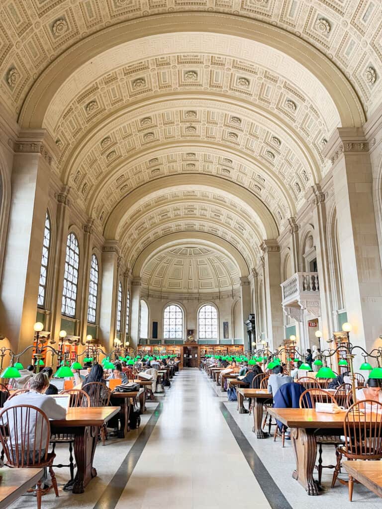 One of the massive and beautiful rooms inside the Boston Public Library. The vaulted ceilings and green lanterns are iconic to Boston.