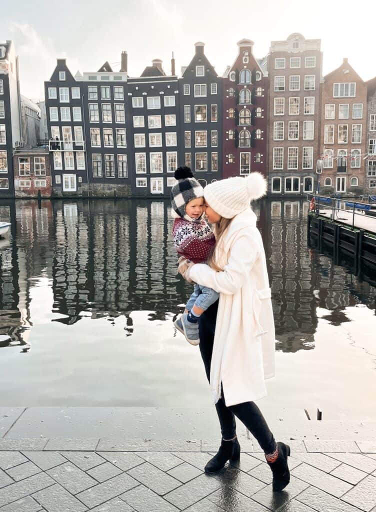 Mom and toddler enjoying Amsterdam in the winter.