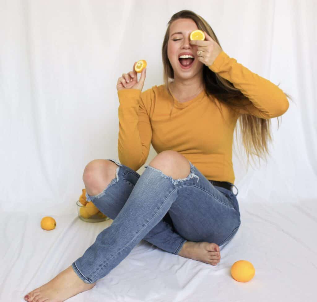 An example of a photo covering one eye with a lemon.