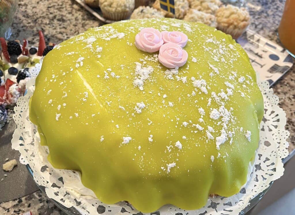 The absolute best swedish dessert a princess cake. The princesstarte is traditionally covered in green marzipan like this homemade one here.