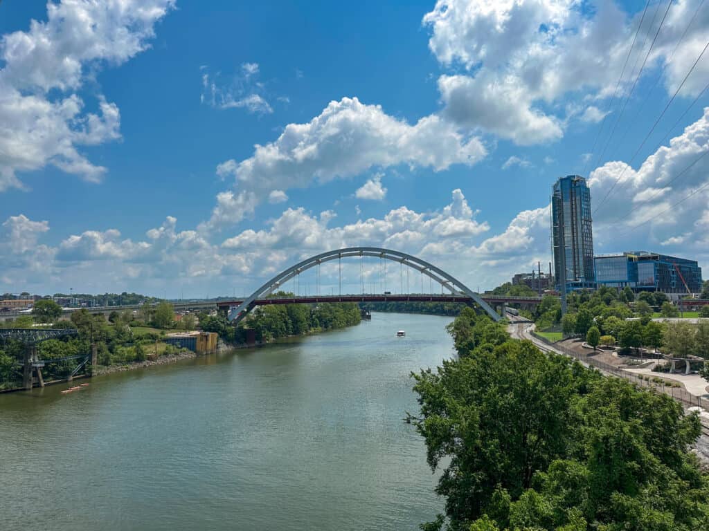 View of the Cumberland River viewed from the John Seigenthaler Pedestrian Bridge in Downtown Nashville.